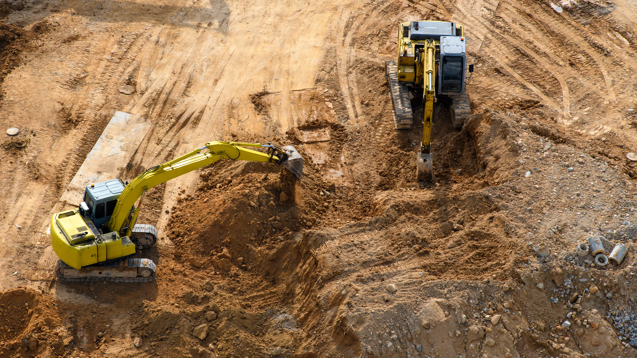 Excavators working on a mining site 