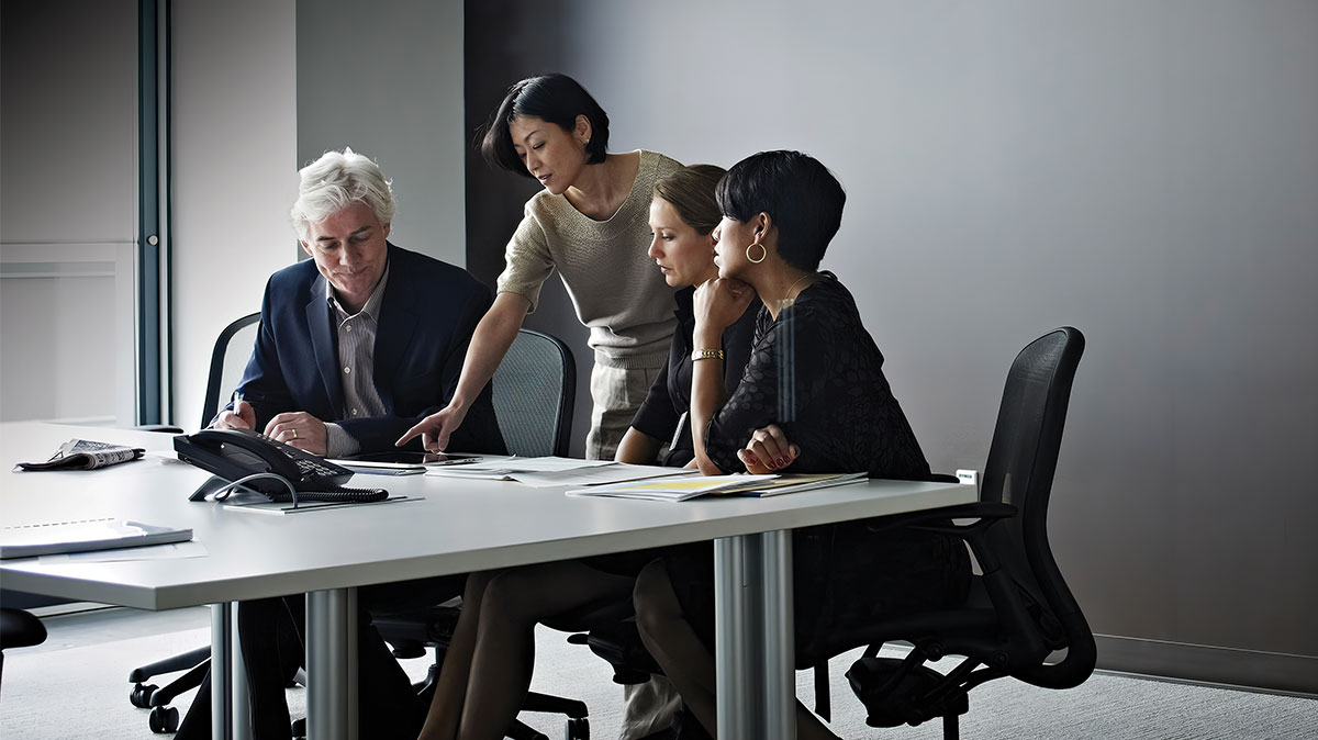 Person standing up in meeting